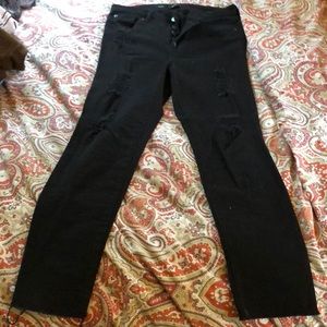 Black high-waisted distressed jeggings